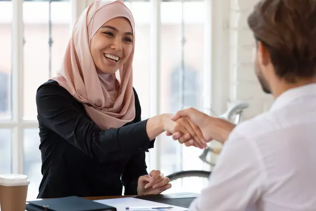 famale shaking hands